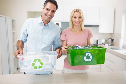 Workers managing construction waste